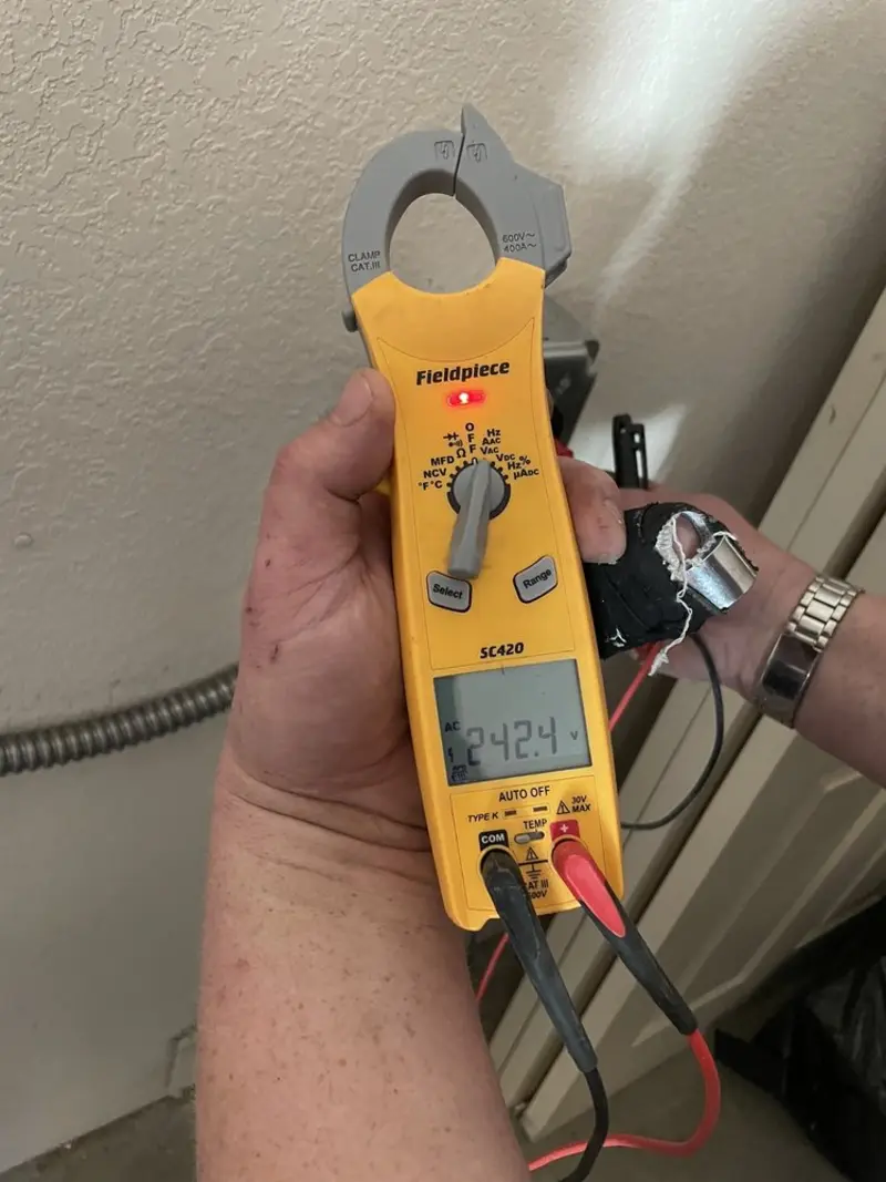 Voltage testing with clamp meter during Generator Installation in Cabot
